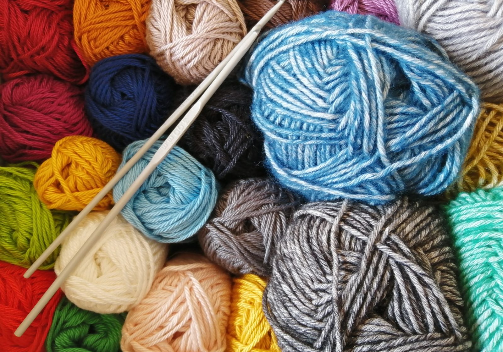 orange blue and white yarn